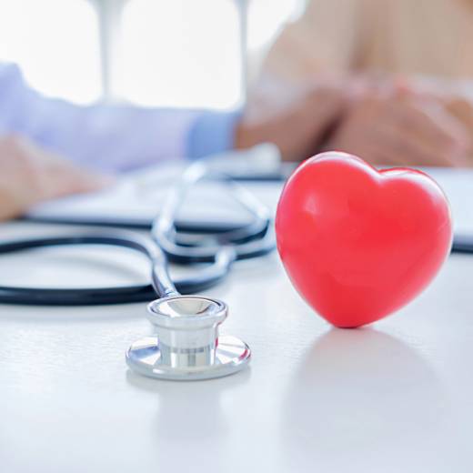 Red heart with stethoscope. Concept healthcare.